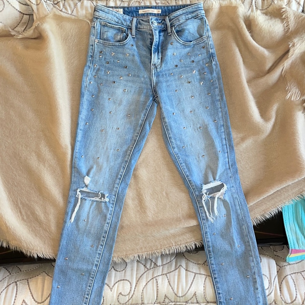 Levi’s 721 high rise skinny star studded jeans